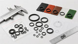 Assorted O-rings with caliper, technical drawing, and material swatches for repair selection